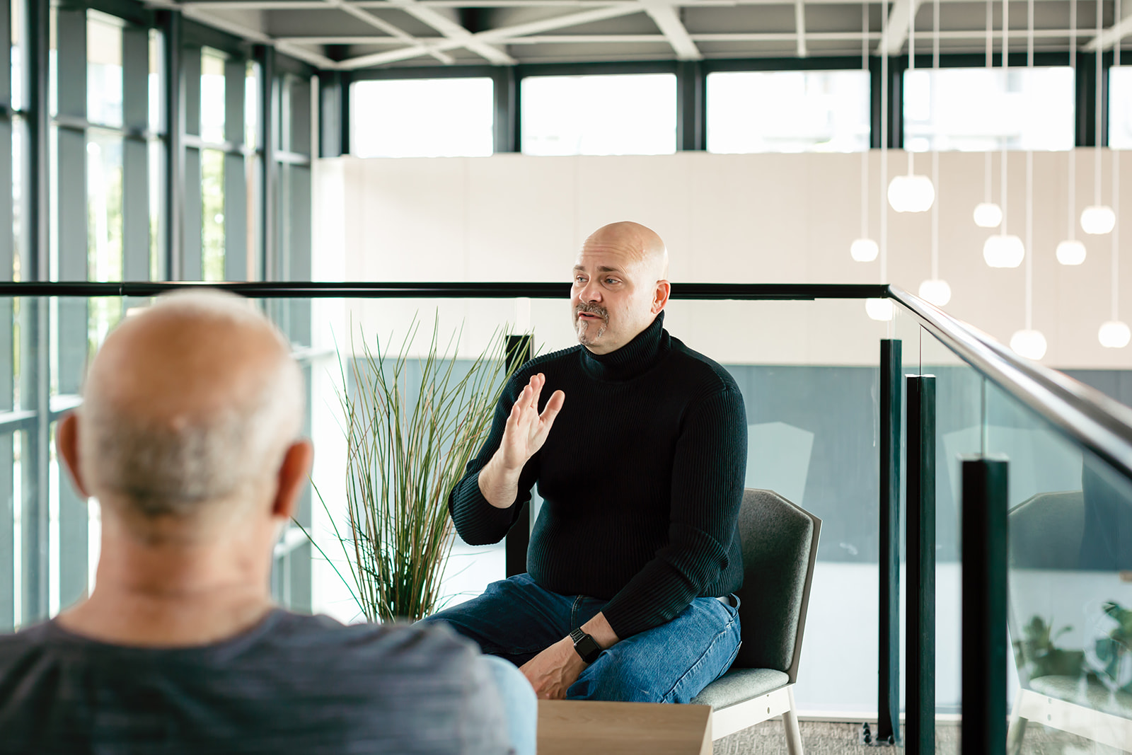 George Watson coaching a client in session
